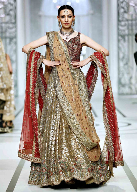 Golden Pakistani Designer Lehenga With Red Choli For Bride – Nameera By 