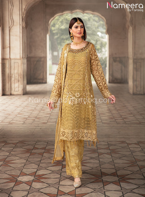 Golden party 2025 dresses pakistani