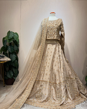 Elegant Pakistani Bridal Dress in Gold Choli Lehenga Style