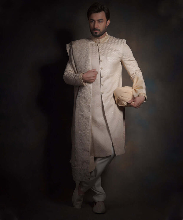 Heavily Embroidered Gold Fitted Pakistani Groom Sherwani in Raw Silk