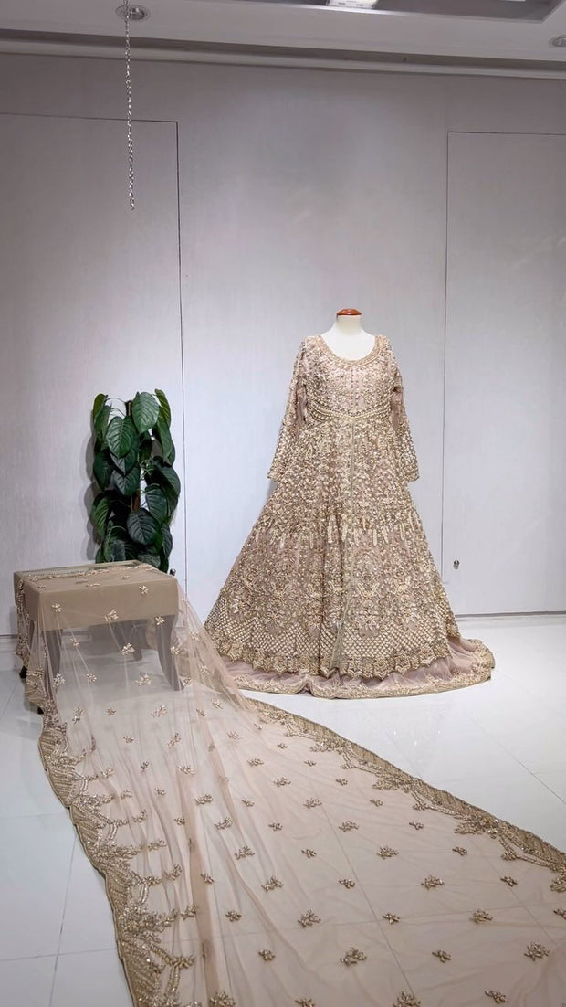 Latest Pakistani Bridal Dress in Gold Choli Lehenga Style