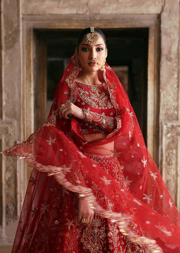 Latest Pakistani Bridal Dress in Red Choli and Lehenga Style