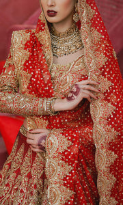 Pakistani Bridal Dress in Red Choli and Lehenga Style