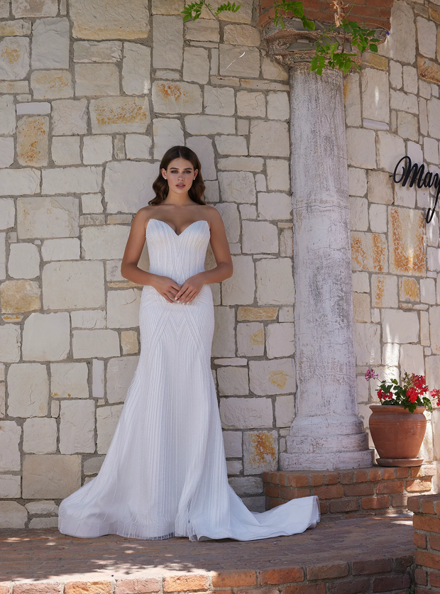 Romantic Mermaid Bridal Gown with Floral Accents and Detachable Skirt