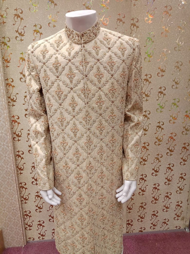Pakistani Latest Sherwani In Offwhite Gold Color Work Embellished With Pure Dabka And Beeds Work.Same Work on Khusa.