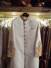 Men Sherwani,Turban And Khusa In Beautiful Offwhite Color.Work Embellished With Pure Zardozi Dabka And Nagh Work.