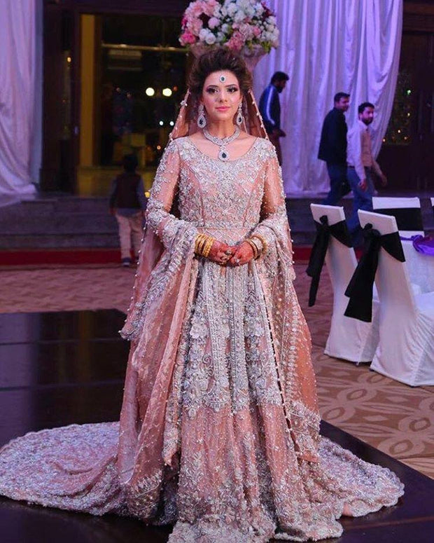 Light pink and silver bridal lahnga set with nagh cutwork threads dabka zari and nagh work Model#L 23