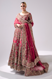 Pakistani Bridal Dress in Embellished Wedding Lehenga Choli and Dupatta Style in Net Fabric