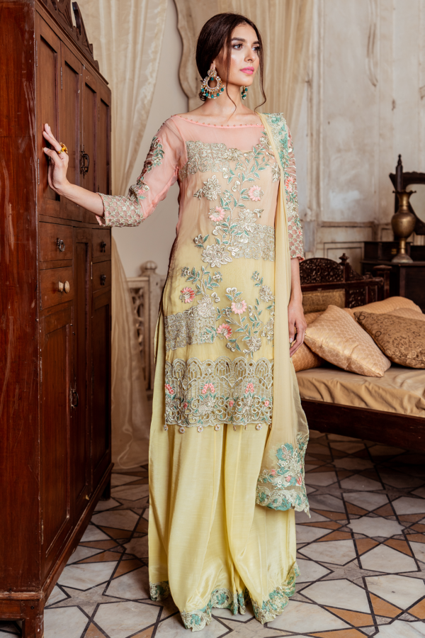 Pakistani chiffon embroidered party dress in lavish yellow color